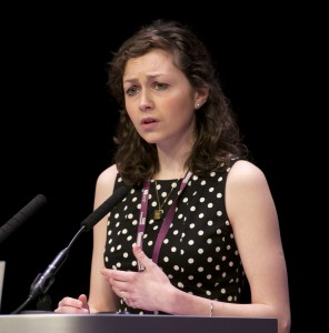 Picture of Molly Case reading her poem Nursing the Nation